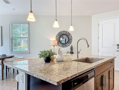 Under contract-accepting backup offers. Beautiful END-UNIT on Eagle Creek Golf Club in Florida - for sale on GolfHomes.com, golf home, golf lot