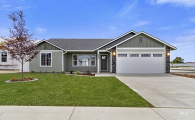 This open floor plan home is a practical design and has an on Scotch Pines Golf Course in Idaho - for sale on GolfHomes.com, golf home, golf lot