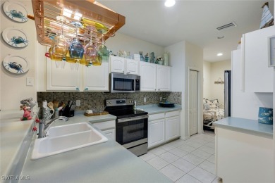 CHARMING WESTERN EXPOSURE 2-BEDROOM VILLA WITH STUNNING LAKE on Herons Glen Golf and Country Club in Florida - for sale on GolfHomes.com, golf home, golf lot