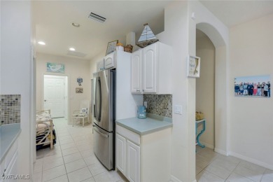 CHARMING WESTERN EXPOSURE 2-BEDROOM VILLA WITH STUNNING LAKE on Herons Glen Golf and Country Club in Florida - for sale on GolfHomes.com, golf home, golf lot