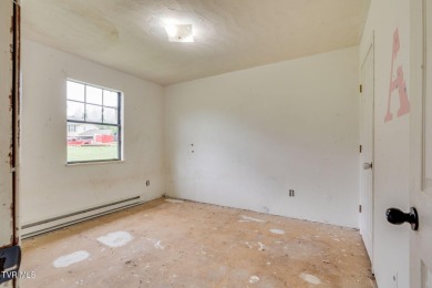 Investment opportunity! This home is loaded with potential. It on Mc Donald Hills Golf Club in Tennessee - for sale on GolfHomes.com, golf home, golf lot