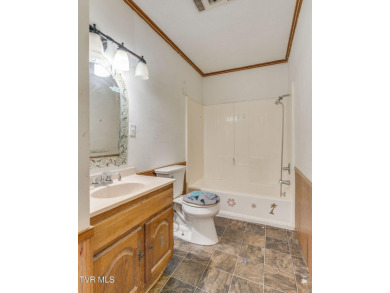 Investment opportunity! This home is loaded with potential. It on Mc Donald Hills Golf Club in Tennessee - for sale on GolfHomes.com, golf home, golf lot