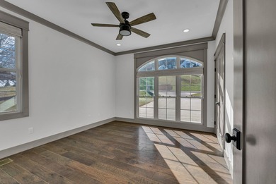 Discover refined living in this custom-built home overlooking on Hidden Valley Golf and Country Club in Tennessee - for sale on GolfHomes.com, golf home, golf lot