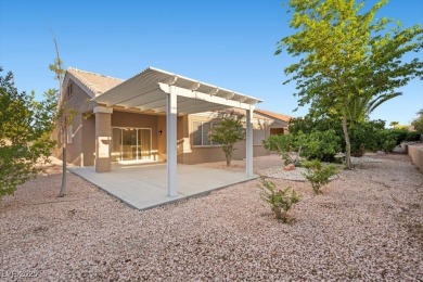 Situated in the heart of Sun City Summerlin, above Eagle Crest on Highland Falls Golf Club in Nevada - for sale on GolfHomes.com, golf home, golf lot