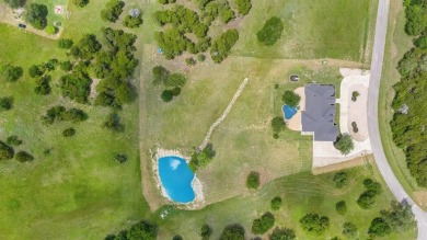 Welcome to 8408 Fullerton Drive! Nestled on 2 acres in the on The Retreat in Texas - for sale on GolfHomes.com, golf home, golf lot
