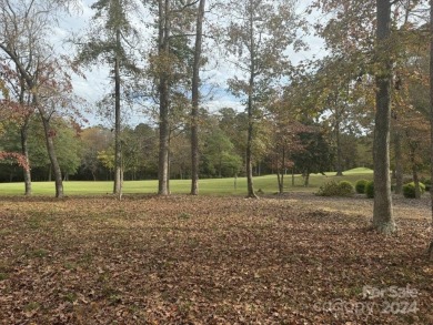 Beautiful, level home site that offers a terrific building site on Old North State Club at Uwharrie Point Golf community in North Carolina - for sale on GolfHomes.com, golf home, golf lot