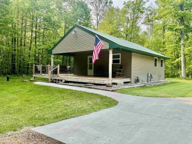 Welcome to your Lakewood retreat! Situated on 1.5 scenic acres on McCauslin Brook Golf and Country Club in Wisconsin - for sale on GolfHomes.com, golf home, golf lot