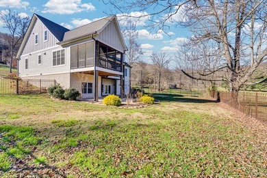 Discover refined living in this custom-built home overlooking on Hidden Valley Golf and Country Club in Tennessee - for sale on GolfHomes.com, golf home, golf lot