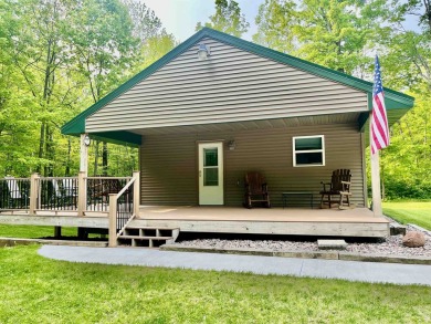 Welcome to your Lakewood retreat! Situated on 1.5 scenic acres on McCauslin Brook Golf and Country Club in Wisconsin - for sale on GolfHomes.com, golf home, golf lot