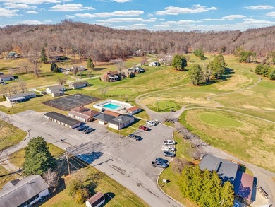 Discover refined living in this custom-built home overlooking on Hidden Valley Golf and Country Club in Tennessee - for sale on GolfHomes.com, golf home, golf lot