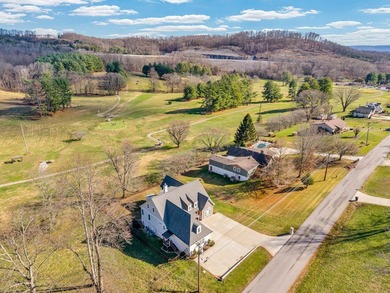 Discover refined living in this custom-built home overlooking on Hidden Valley Golf and Country Club in Tennessee - for sale on GolfHomes.com, golf home, golf lot