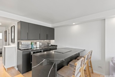 This beautifully updated, fully furnished unit offers stunning on Ala Wai Golf Course in Hawaii - for sale on GolfHomes.com, golf home, golf lot