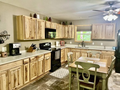 Welcome to your Lakewood retreat! Situated on 1.5 scenic acres on McCauslin Brook Golf and Country Club in Wisconsin - for sale on GolfHomes.com, golf home, golf lot