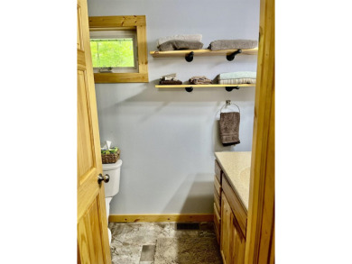Welcome to your Lakewood retreat! Situated on 1.5 scenic acres on McCauslin Brook Golf and Country Club in Wisconsin - for sale on GolfHomes.com, golf home, golf lot