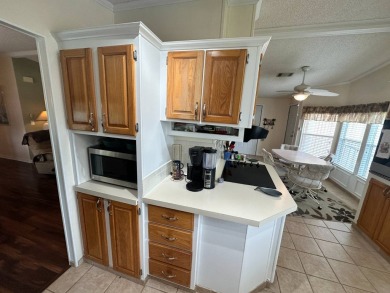 This well cared for 2-bedroom, 2 bathrooms Palm Harbor home on Del Tura Golf and Country Club in Florida - for sale on GolfHomes.com, golf home, golf lot