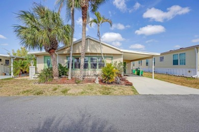 This charming 2-bedroom, 2-bathroom home is situated on a on Maple Leaf Golf and Country Club in Florida - for sale on GolfHomes.com, golf home, golf lot