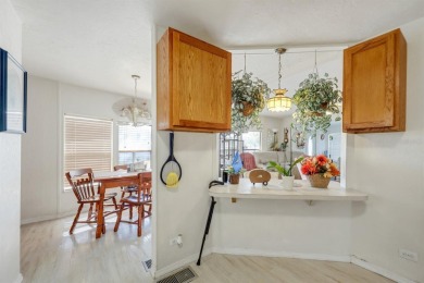 This charming 2-bedroom, 2-bathroom home is situated on a on Maple Leaf Golf and Country Club in Florida - for sale on GolfHomes.com, golf home, golf lot