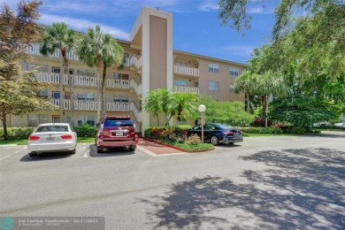 One word describes this first floor, two bedroom/two bathroom on Wynmoor Golf Course in Florida - for sale on GolfHomes.com, golf home, golf lot