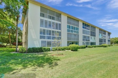 One word describes this first floor, two bedroom/two bathroom on Wynmoor Golf Course in Florida - for sale on GolfHomes.com, golf home, golf lot