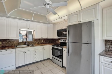 One word describes this first floor, two bedroom/two bathroom on Wynmoor Golf Course in Florida - for sale on GolfHomes.com, golf home, golf lot