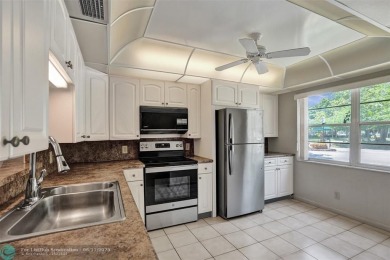 One word describes this first floor, two bedroom/two bathroom on Wynmoor Golf Course in Florida - for sale on GolfHomes.com, golf home, golf lot