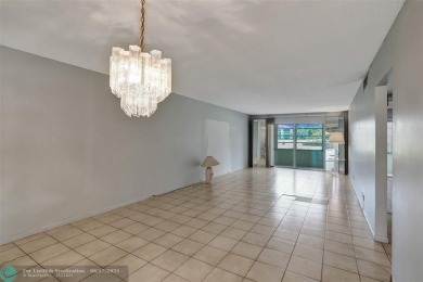 One word describes this first floor, two bedroom/two bathroom on Wynmoor Golf Course in Florida - for sale on GolfHomes.com, golf home, golf lot
