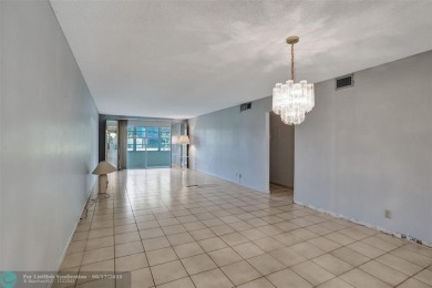 One word describes this first floor, two bedroom/two bathroom on Wynmoor Golf Course in Florida - for sale on GolfHomes.com, golf home, golf lot