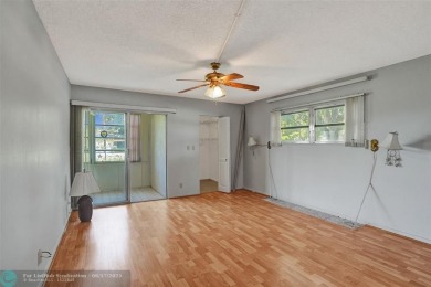 One word describes this first floor, two bedroom/two bathroom on Wynmoor Golf Course in Florida - for sale on GolfHomes.com, golf home, golf lot