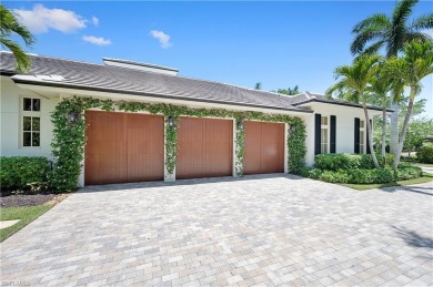 In the heart of the Moorings sits a picture-perfect single story on The Moorings Country Club in Florida - for sale on GolfHomes.com, golf home, golf lot