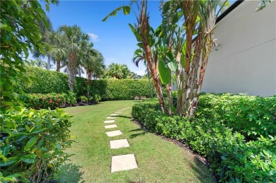 In the heart of the Moorings sits a picture-perfect single story on The Moorings Country Club in Florida - for sale on GolfHomes.com, golf home, golf lot