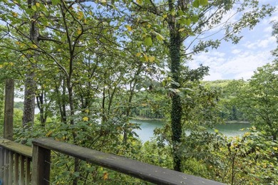 Wake to sweeping Greers Ferry Lake views from this peaceful on Mountain Ranch Golf Club in Arkansas - for sale on GolfHomes.com, golf home, golf lot