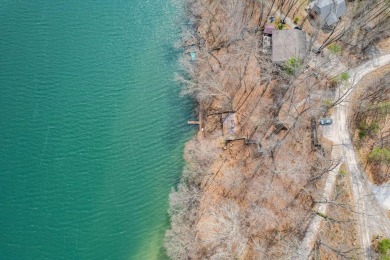 Homes on the lake are going for high prices (OVER $1,000,000) on Hide-A-Way Hills Golf Club in Ohio - for sale on GolfHomes.com, golf home, golf lot
