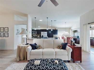 This LOVELY 3/2 IRIS Designer sits on an OVERSIZED lot with on Pennbrooke Fairways in Florida - for sale on GolfHomes.com, golf home, golf lot