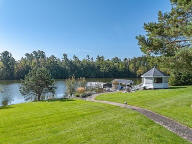 Mint condition 4 bedroom, 5 bath home on the Eagle River /Three on Eagle River Golf Course in Wisconsin - for sale on GolfHomes.com, golf home, golf lot