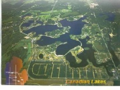 Lot 7 of Bantry Bay II offers the most panoramic view of on Tullymore Golf Club in Michigan - for sale on GolfHomes.com, golf home, golf lot