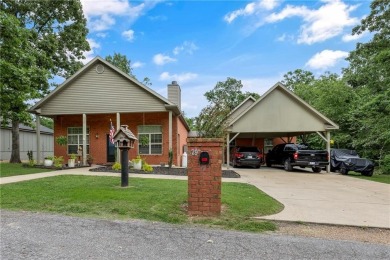 Welcome to your private escape in Bella Vista, Arkansas! Tucked on Bella Vista Country Club - Highlands in Arkansas - for sale on GolfHomes.com, golf home, golf lot