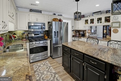 WELCOME HOME TO LAKE DOW NORTH! Located in the prestigious and on Canongate At Georgia National Golf Club in Georgia - for sale on GolfHomes.com, golf home, golf lot