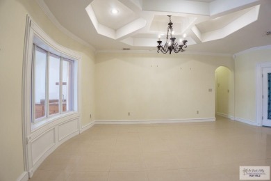 This beautiful 4-bedroom, 3.5-bath home with a finished 3-car on South Padre Island Golf Club in Texas - for sale on GolfHomes.com, golf home, golf lot