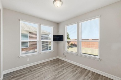 Charming Abbeyville Model located in the vibrant 55+ community on Frisco Lakes Golf Course in Texas - for sale on GolfHomes.com, golf home, golf lot