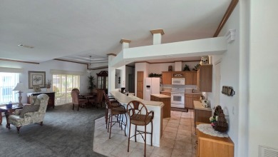 Turn-Key 4BR/3BA Palm Harbor Home | 2,520 Sq. Ft. | Corner Lot | on Schalamar Creek Golf and Country Club in Florida - for sale on GolfHomes.com, golf home, golf lot