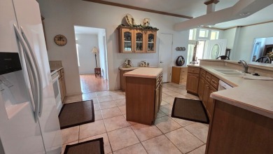 Turn-Key 4BR/3BA Palm Harbor Home | 2,520 Sq. Ft. | Corner Lot | on Schalamar Creek Golf and Country Club in Florida - for sale on GolfHomes.com, golf home, golf lot