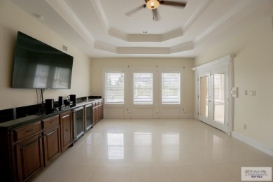 This beautiful 4-bedroom, 3.5-bath home with a finished 3-car on South Padre Island Golf Club in Texas - for sale on GolfHomes.com, golf home, golf lot