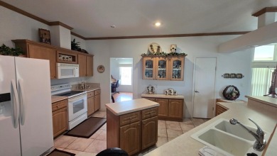 Turn-Key 4BR/3BA Palm Harbor Home | 2,520 Sq. Ft. | Corner Lot | on Schalamar Creek Golf and Country Club in Florida - for sale on GolfHomes.com, golf home, golf lot