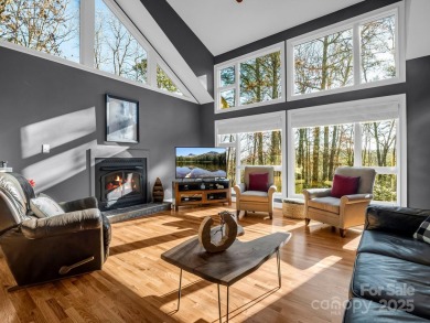 Modern farmhouse meets contemporary chic in this beautiful on Rumbling Bald Resort on Lake Lure in North Carolina - for sale on GolfHomes.com, golf home, golf lot