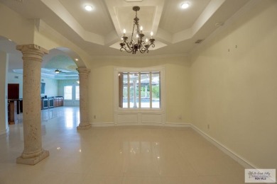 This beautiful 4-bedroom, 3.5-bath home with a finished 3-car on South Padre Island Golf Club in Texas - for sale on GolfHomes.com, golf home, golf lot