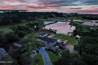 Discover the pinnacle of Lowcountry living at 618 Dolphin Annex on Ocean Point Golf Links in South Carolina - for sale on GolfHomes.com, golf home, golf lot
