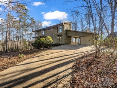 Modern farmhouse meets contemporary chic in this beautiful on Rumbling Bald Resort on Lake Lure in North Carolina - for sale on GolfHomes.com, golf home, golf lot