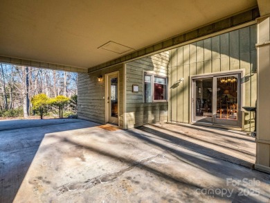 Modern farmhouse meets contemporary chic in this beautiful on Rumbling Bald Resort on Lake Lure in North Carolina - for sale on GolfHomes.com, golf home, golf lot