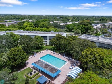 Enjoy resort-style living at an unbeatable price in the vibrant on Wynmoor Golf Course in Florida - for sale on GolfHomes.com, golf home, golf lot
