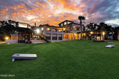 Discover the pinnacle of Lowcountry living at 618 Dolphin Annex on Ocean Point Golf Links in South Carolina - for sale on GolfHomes.com, golf home, golf lot